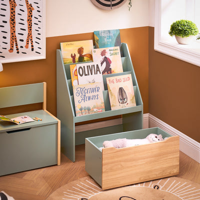 Boîte de rangement en bas pour organiser les jouets, optimisant l'espace.